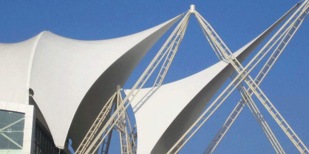 Which is more commonly used, the frame-type membrane structure or the tensioned membrane structure